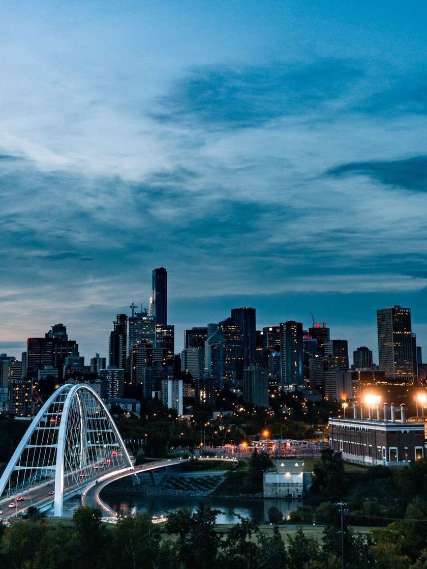 The Edmonton skyline and Walterdale Bridge at night.