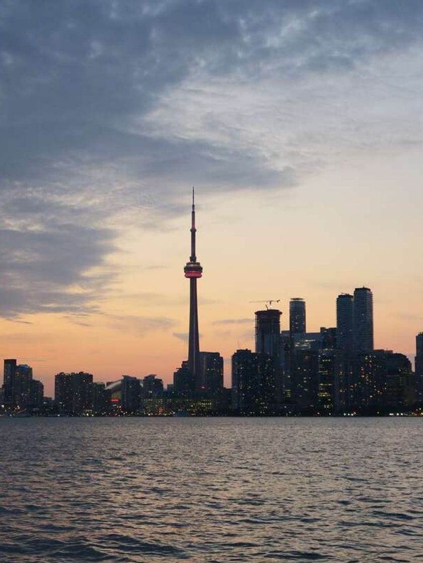 A silhouette of the CN Tower and skyscrapers of downtown Toronto.